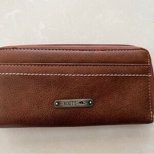 Roots slim zip around wallet